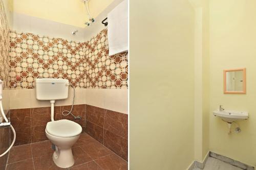 Hotel O Sruan Inn Kamineni Bus Stopにあるバスルーム