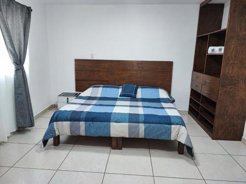 Cama o camas de una habitación en Hospedaje Castillo