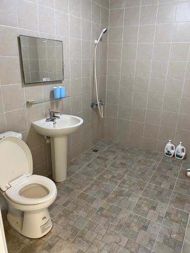 Un baño de 暖暖旅宿
