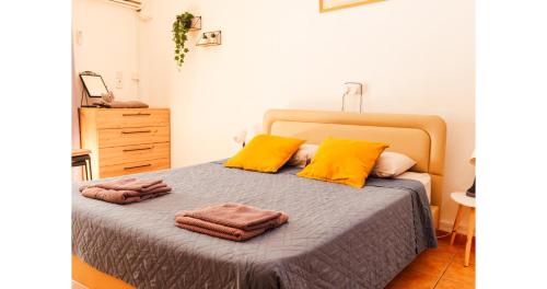 Postel nebo postele na pokoji v ubytování Nissus Urban