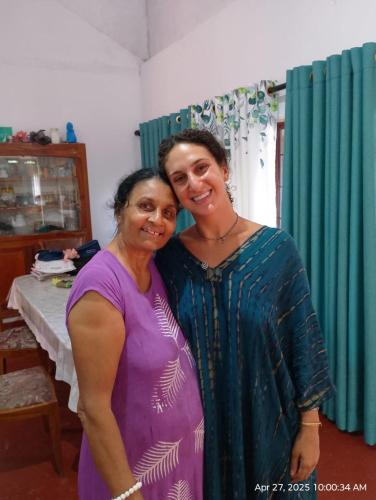 two women are standing next to each other at The Nest in Weligama