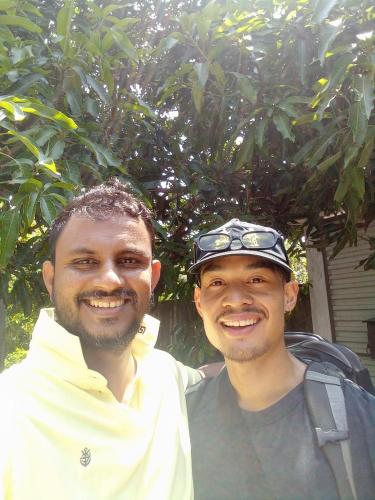two men are standing next to each other at The Nest in Weligama