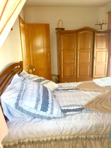 Ένα ή περισσότερα κρεβάτια σε δωμάτιο στο Quarto privado Eixo Atlântico