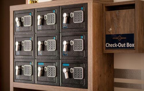 a control box for a room with a check out box at Citylife Rooms in Mosonmagyaróvár