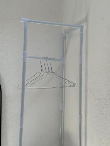 a metal shelf in a room with a door at Vigliata Sidirounta Traditional Stonehouse in Chios