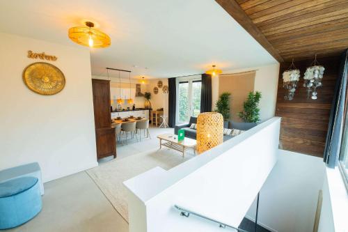 a living room and kitchen in a house at Upscale 90m2 Two Bedroom Apartment - KS8B in Eindhoven