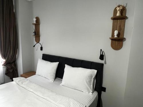 Ein Bett oder Betten in einem Zimmer der Unterkunft The iderot Otel Taksim