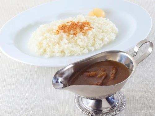 a plate of rice and a bowl of sauce at HOTEL felice Osaka Itami Airport - Vacation STAY 54193v in Toyonaka