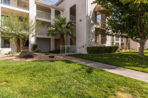 a walkway in front of a apartment building at 2012 LP PS4, Private Balcony with Beautiful Mountain Views, and Great Clubhouse Amenities in St. George