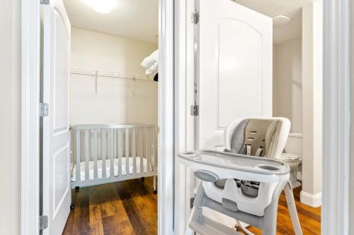a bathroom with a sink and a baby crib at Lake Views At Blue Heron in Orlando
