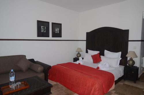 Ένα ή περισσότερα κρεβάτια σε δωμάτιο στο Hôtel Océan Vagabond