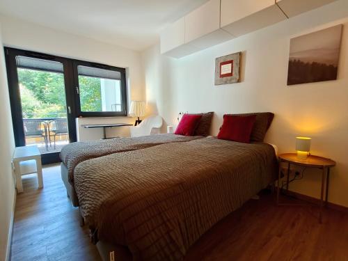 Katil atau katil-katil dalam bilik di Elpe Apartments Hochsauerland