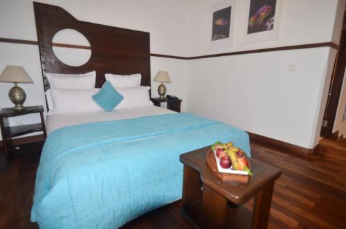 Ένα ή περισσότερα κρεβάτια σε δωμάτιο στο Hôtel Océan Vagabond