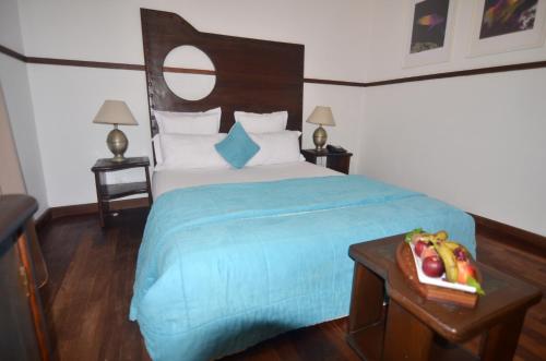 Ένα ή περισσότερα κρεβάτια σε δωμάτιο στο Hôtel Océan Vagabond