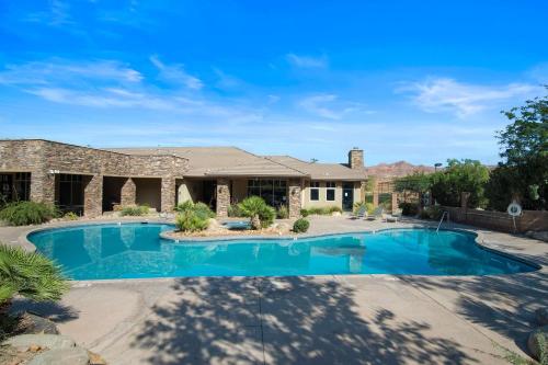 a swimming pool in front of a house at Owens Landing - Amazing Views in Washington