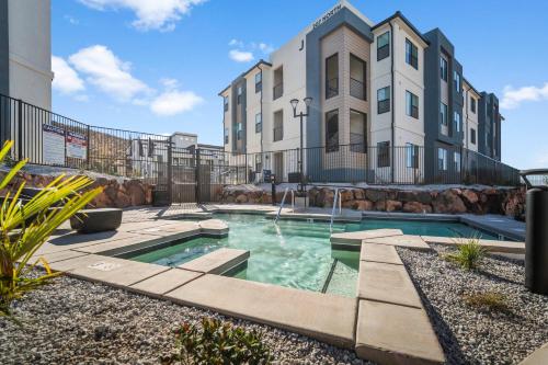 a swimming pool in front of a building at The View - Resort Amenities & Epic Views in Washington