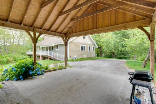 a view of a house from under a pavilion at Getaway with Guest House - 6 Mi to Lake Glenville! in Glenville