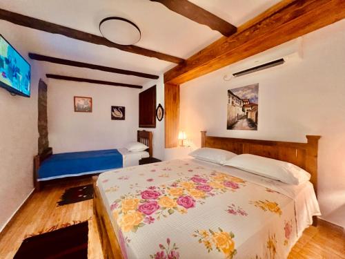 Postel nebo postele na pokoji v ubytování KRIS Guesthouse