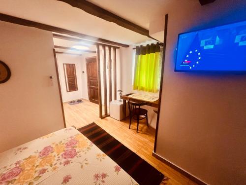 TV a/nebo společenská místnost v ubytování KRIS Guesthouse