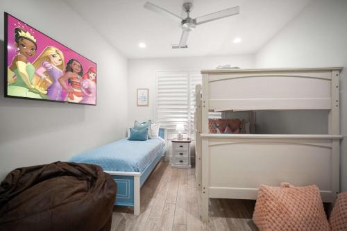 a childs bedroom with a bunk bed and a playroom at Live in Fantasy at Disney in the Desert in Washington