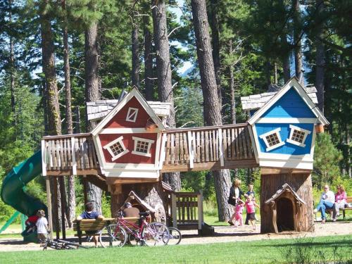 a play park with a wooden play house at Suncadia 5 Bdrm Custom Home, Perfect for Small Events in Cle Elum
