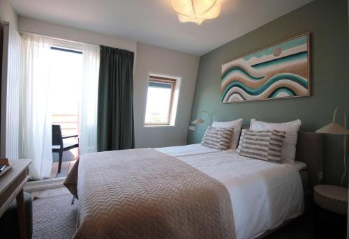 Cama o camas de una habitación en Best Western Beach Hotel Bergen aan Zee