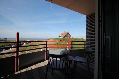 Un balcón o terraza de Best Western Beach Hotel Bergen aan Zee