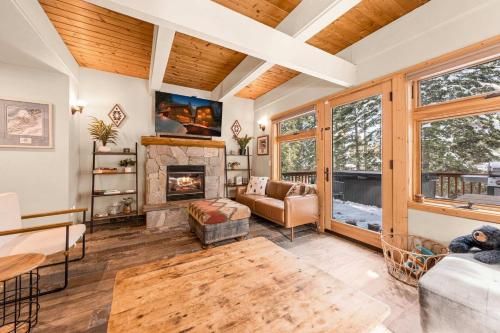 a living room with a fireplace and a couch at Tahoe City Retreat - For 8 in Tahoe City