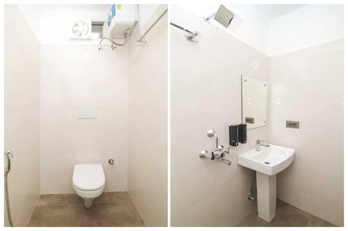 a bathroom with a toilet and a sink at Hotel O Ranchi Station Road Near Gurudwara in Rānchī