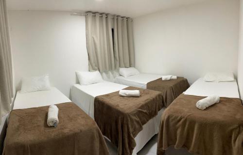 Postel nebo postele na pokoji v ubytování Rede de Hotel 99