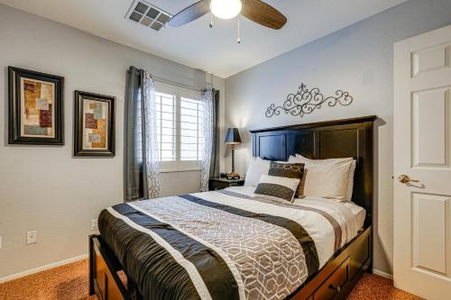 a bedroom with a large bed and a window at Spacious Family Oasis in Cave Creek! in Cave Creek