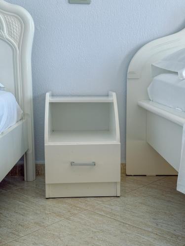 Una cama o camas en una habitación de Hotel Bahamas