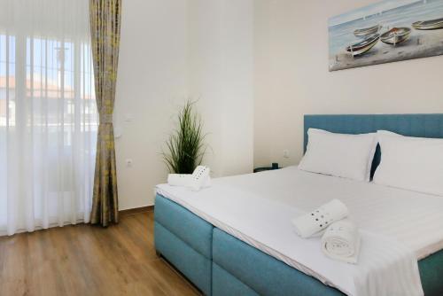Postel nebo postele na pokoji v ubytování Kalina house