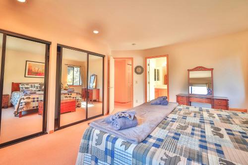 a bedroom with a large bed and a mirror at Tahoe Family Getaway in Stateline