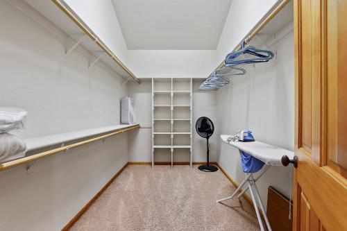 a room with a walk in closet with a shelf at The Lodge on Oaxaco - Epic Man Cave with Billiard Room in South Lake Tahoe