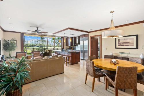 a living room with a couch and a table at Gorgeous Villa in Ko Olina in Kapolei