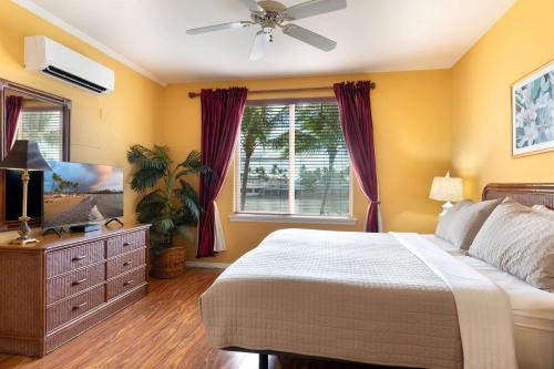Postel nebo postele na pokoji v ubytování Fairway Villas Lanai Overlook