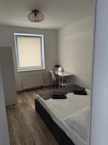 Postel nebo postele na pokoji v ubytování Apartament Kaszmir Rybno