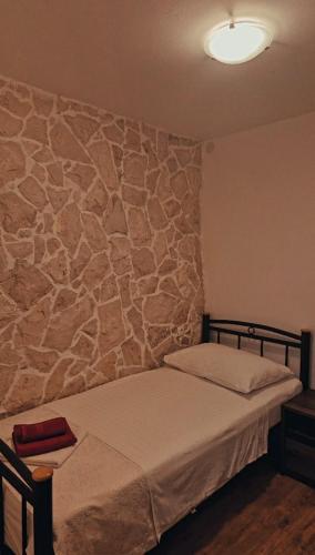 Ένα ή περισσότερα κρεβάτια σε δωμάτιο στο Apartment Tia Vis