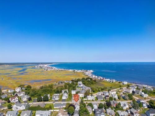 an aerial view of a neighborhood with houses and the ocean at New Short distance to Ocean in Wells