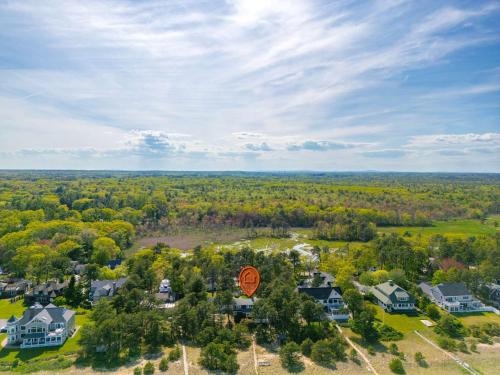 an overhead view of a home with a road sign at Beachfront and only 30 Steps To Beach in Saco