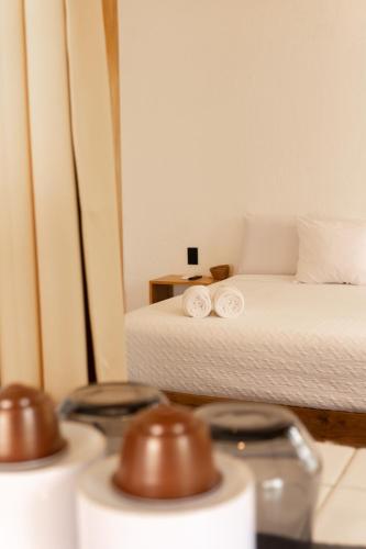 Postel nebo postele na pokoji v ubytování Hotel Solana Bacalar Lakefront