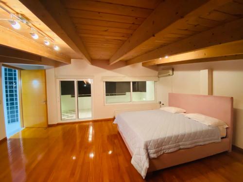 Кровать или кровати в номере Asclepeias Ionian Villa