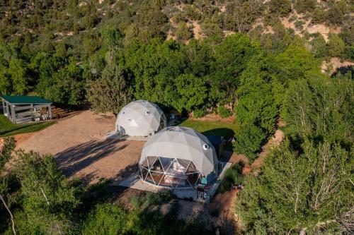 an overhead view of two tents in a field at 2 domes in Glendale Utah Fantastic Stargazing in Glendale