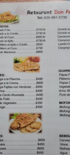 a menu for a restaurant with some food on it at Villa Colonial Room 7 in Río San Juan