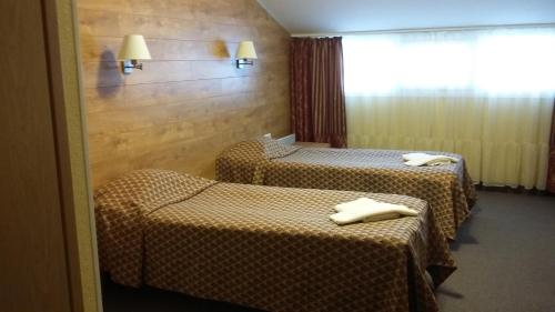Hotell Wironiaにあるベッド