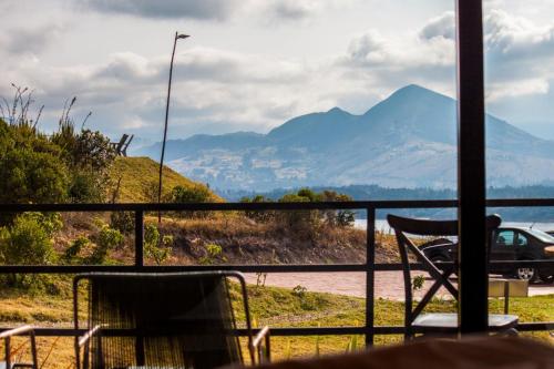a balcony with a view of the mountains at La Dolce Vita, Guatavita in Guasca