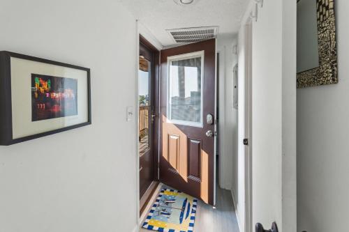 a hallway with a door and a rug at C323C - Keep On Duckin' in Duck