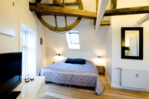Postel nebo postele na pokoji v ubytování Den Gamle Købmandsgaard Bed & Breakfast