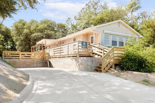 a house with a large deck and a driveway at 8635 - High on the Hill in Frisco